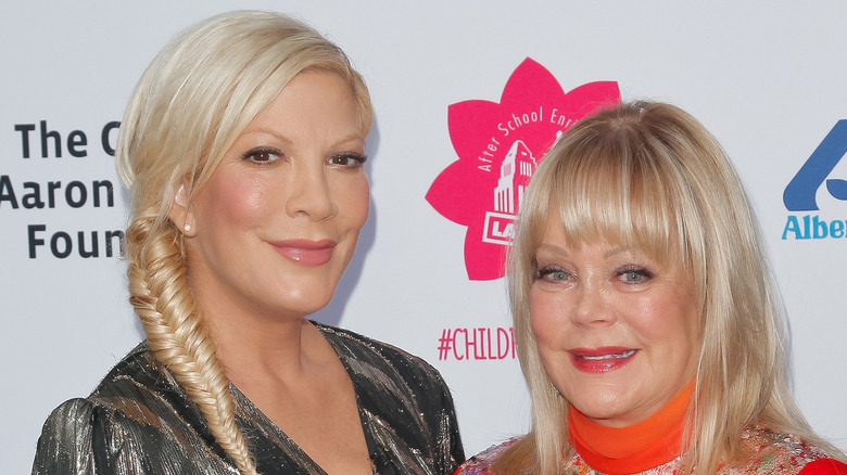 Tori and Candy Spelling smiling