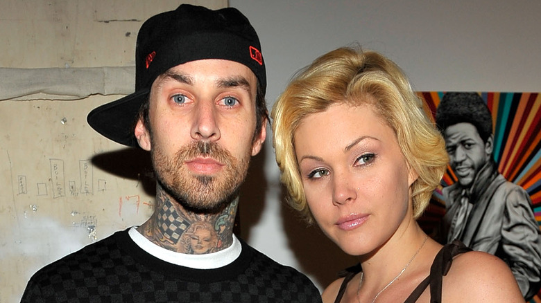 Travis Barker and Shanna Moakler posing