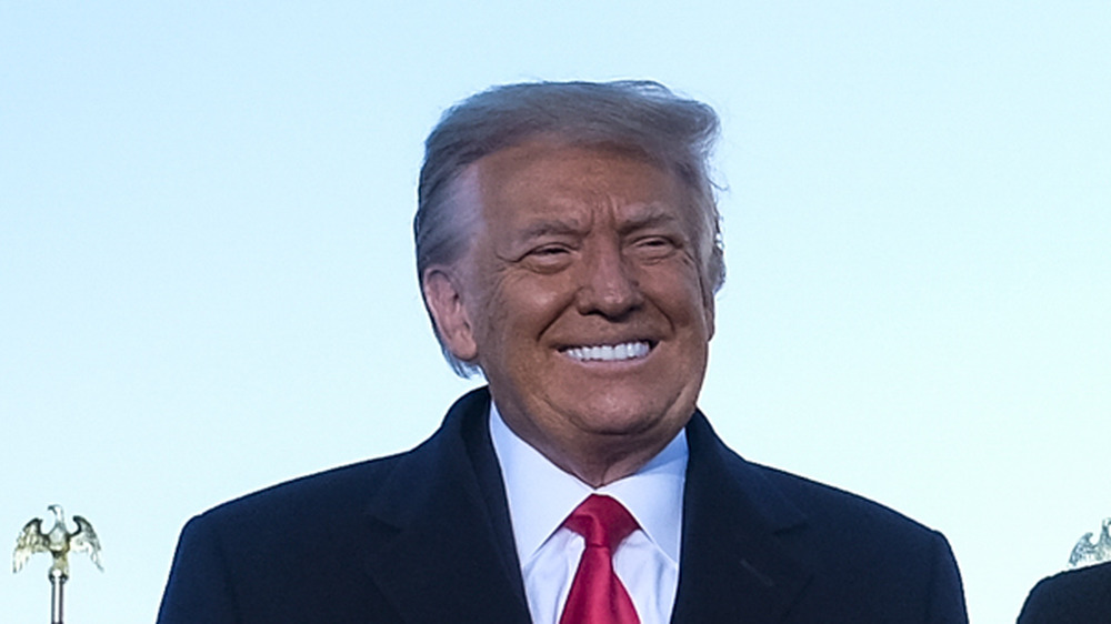 Donald Trump in a teeth-baring grin