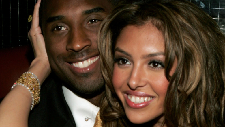 Kobe and Vanessa Bryant pose for a photo 