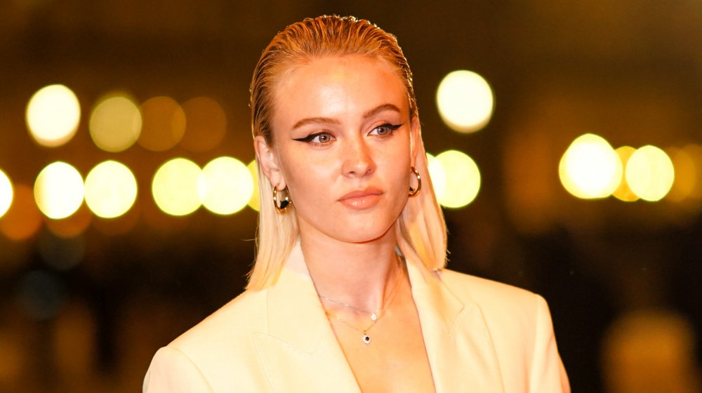 Zara Larsson with hair slicked back