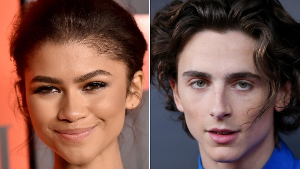 Zendaya, Timothée Chalamet smiling at camera