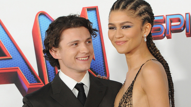 Tom Holland looking at Zendaya