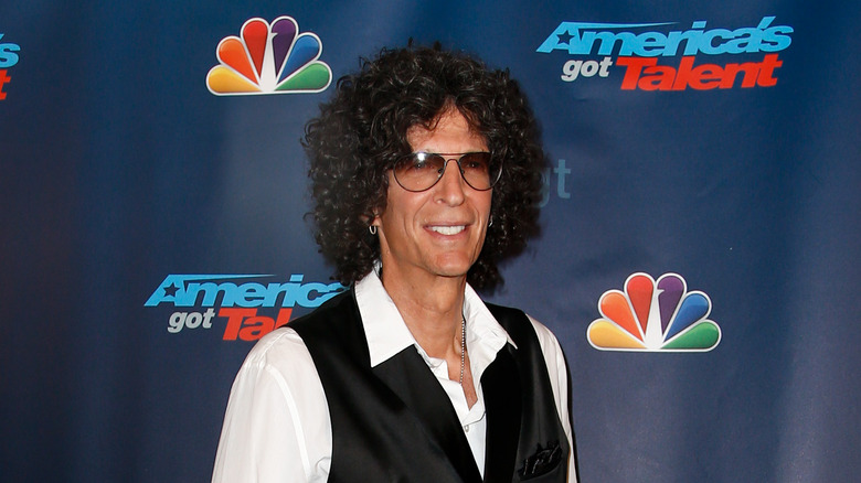 Howard Stern poses on red carpet