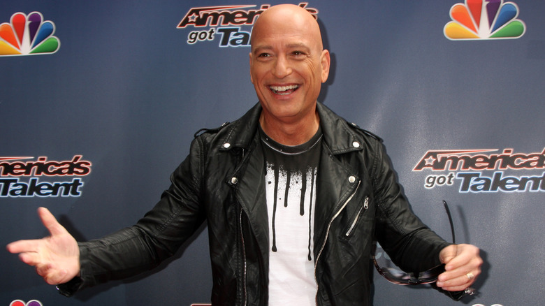 Howie Mandel smiles on red carpet