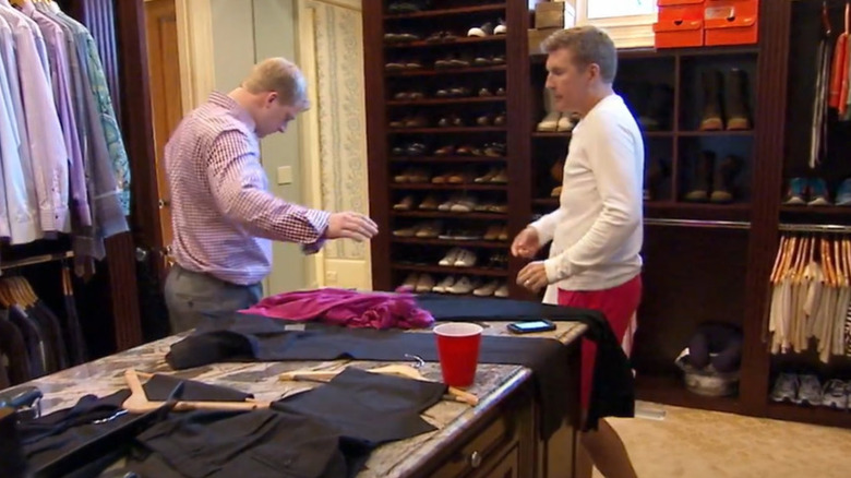 Todd Chrisley and Kyle Chrisley in a walk-in closet