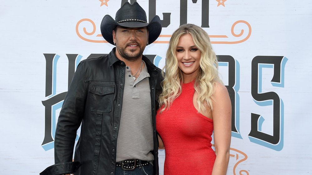 Jason Aldean, Brttany Kerr arm in arm and smiling