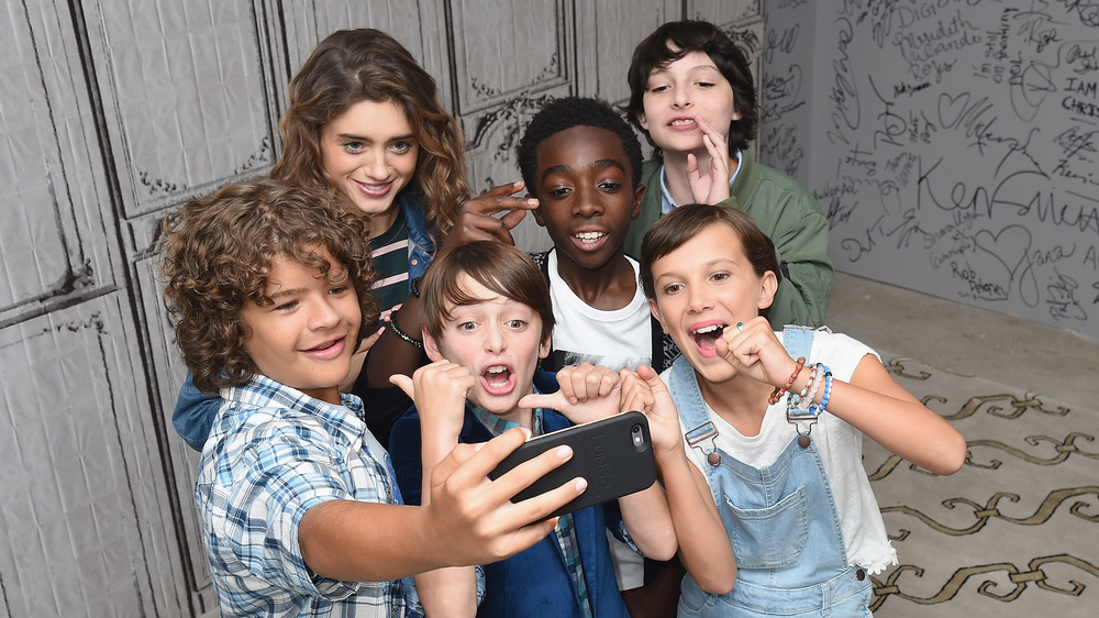 The Stranger Things cast taking a selfie