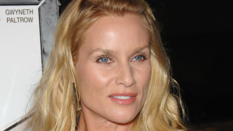 Nicolette Sheridan looking off to the side