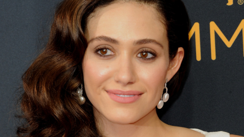 Emmy Rossum grinning