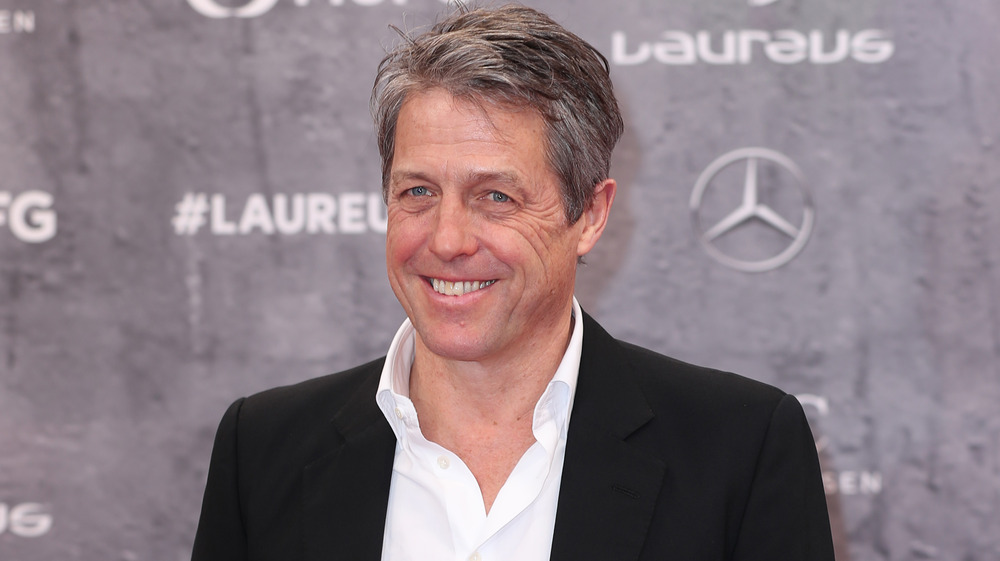 Hugh Grant smiling