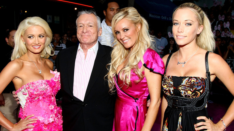 Holly Madison, Hugh Hefner, Bridget Marquardt, Kendra Wilkinson smiling