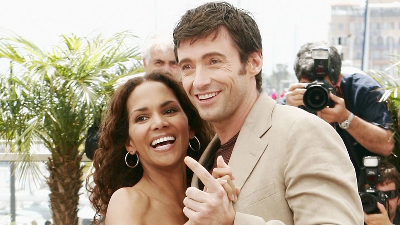 Halle Berry and Hugh Jackman smiling and dancing