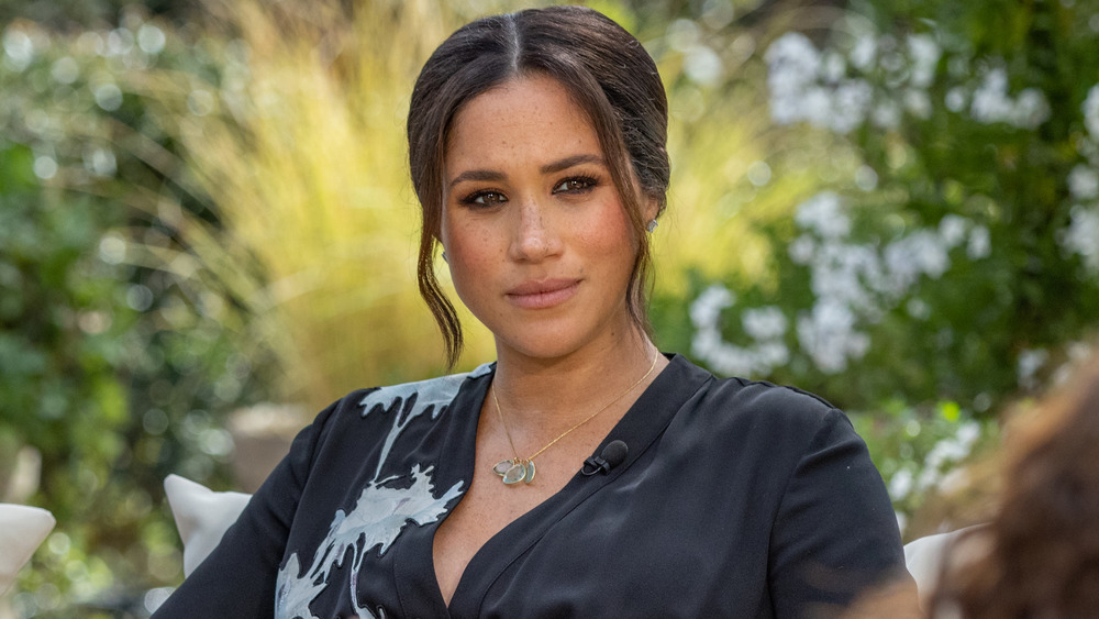 Meghan Markle staring during Oprah interview