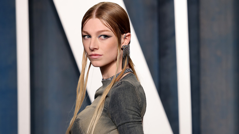 Hunter Schafer long hair green cat eye makeup