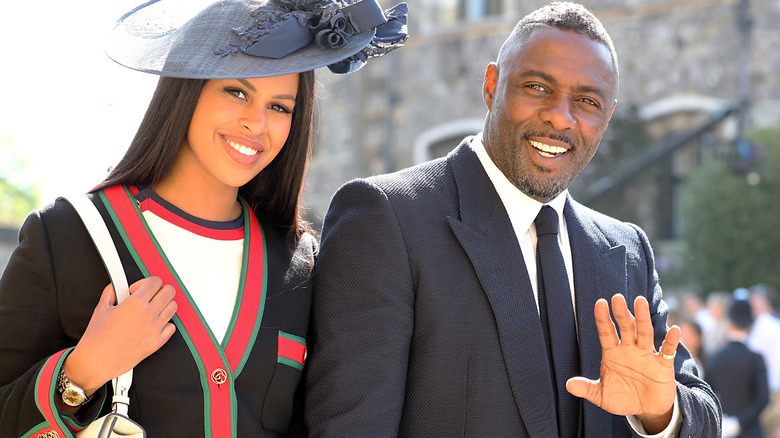 Idris Elba and Sabrina Dhowre arrive at Meghan and Harry's wedding