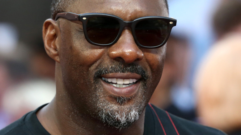 Idris Elba wearing sunglasses 