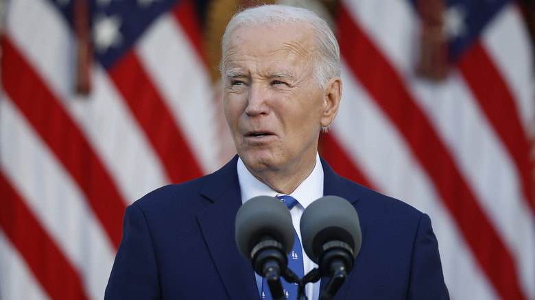 Joe Biden looking confused at a podium