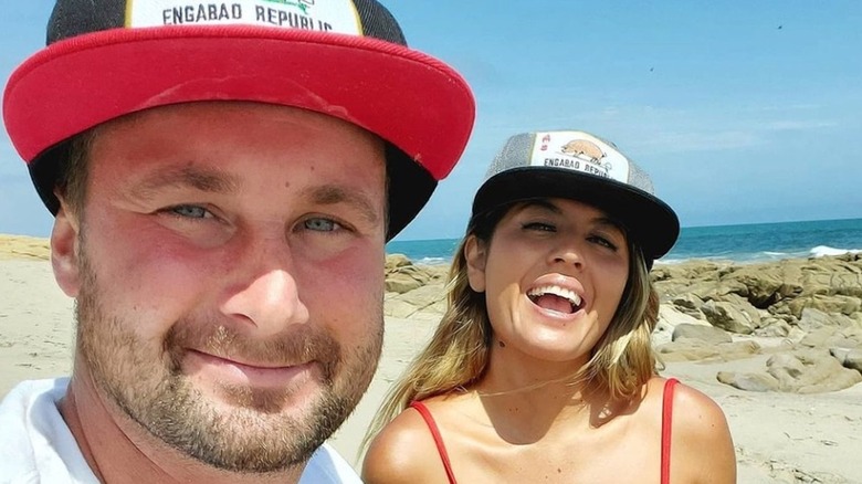 Corey and Evelin in a selfie on the beach