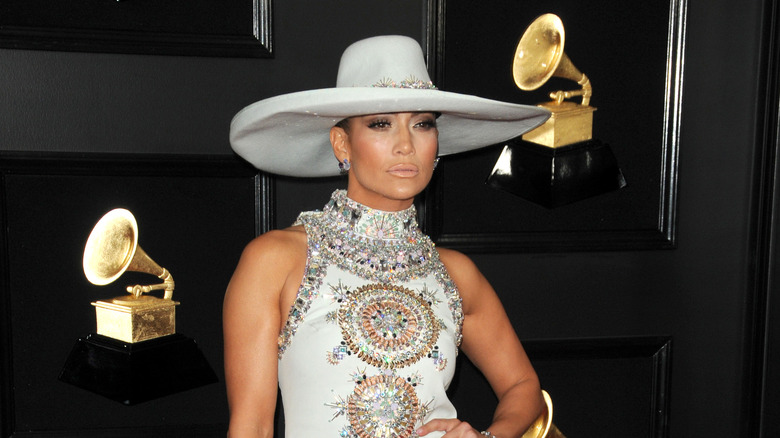 Jennifer Lopez gives a smoldering look on the red carpet in a cowboy hat