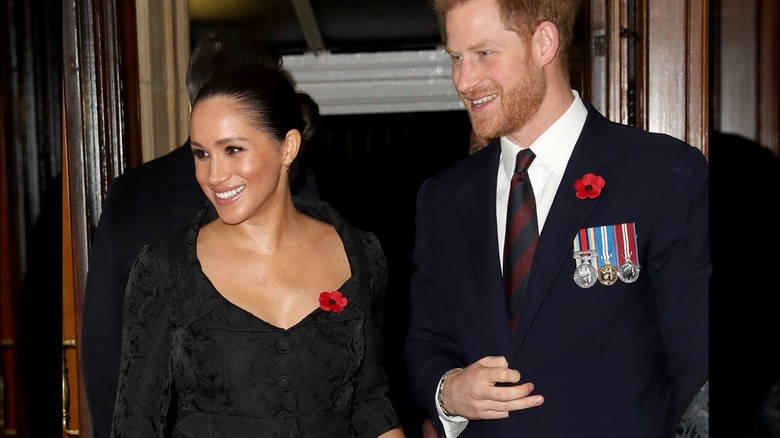 Meghan Markle black dress cleavage