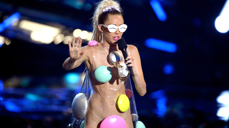 Miley Cyrus wears clear plastic dress