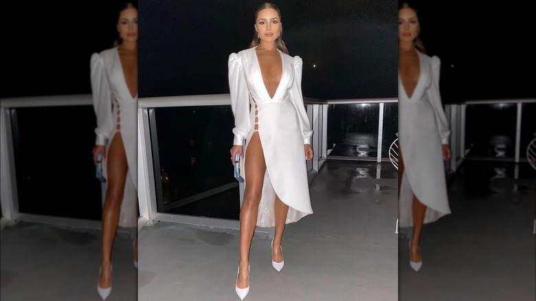 Olivia Culpo wearing white dress