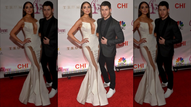 Olivia Culpo, Nick Jonas posing