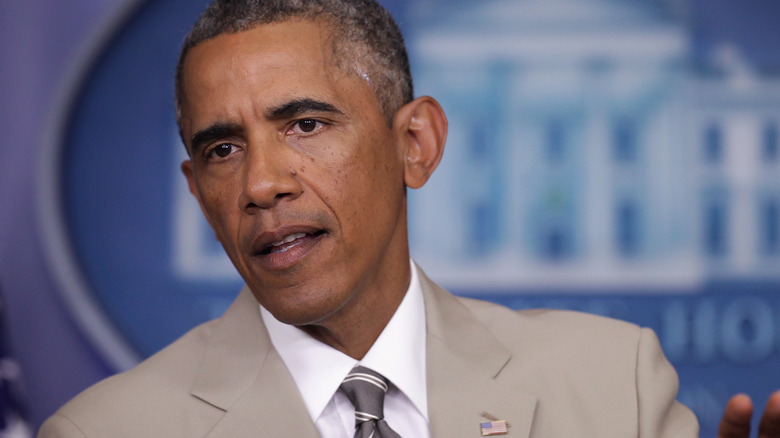 Barack Obama wearing a tan suit 