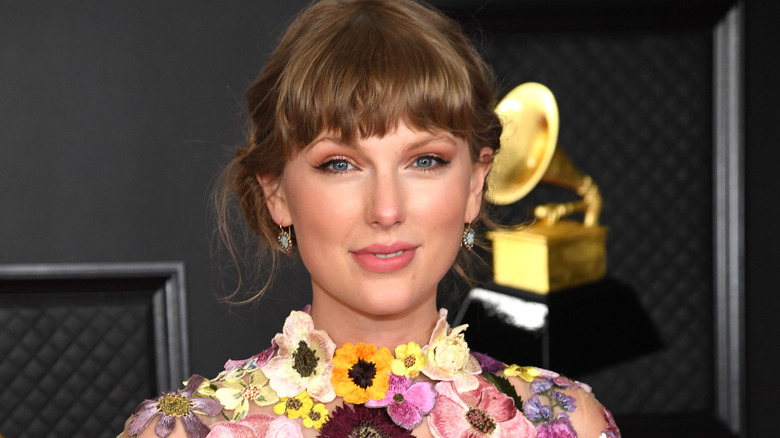 Taylor Swift posing in the media room during the 63rd Annual GRAMMY Awards