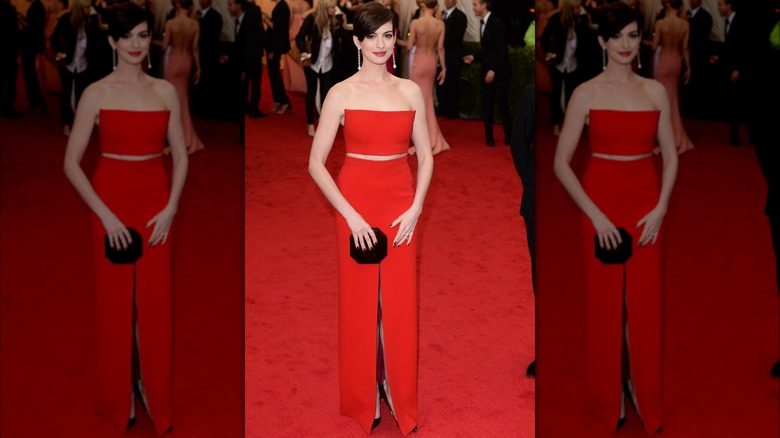 Anne Hathaway wearing red two-piece outfit
