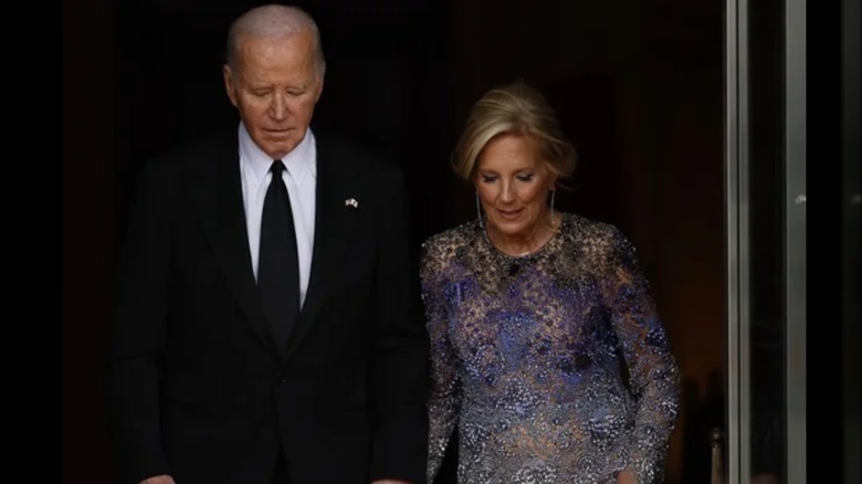 Jill Biden walking Joe Biden