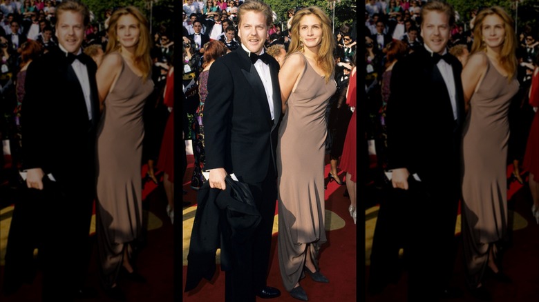 Kiefer Sutherland, Julia Robert posing on red carpet