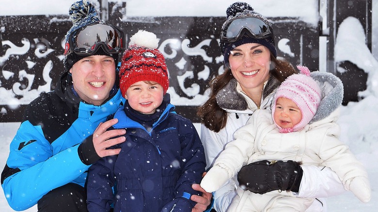 Prince William, Prince George, Kate Middleton, and Princess Charlotte enjoying snowfall