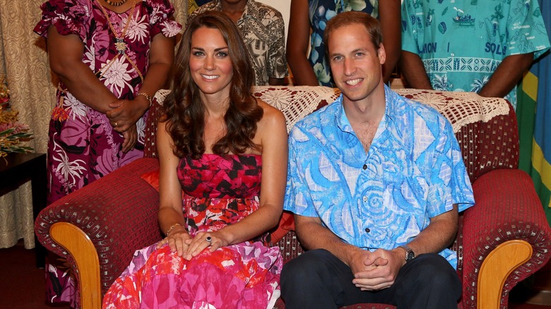 Kate Middleton and Prince William sitting next to each other