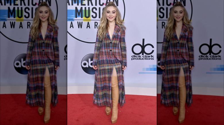 Sabrina Carpenter wearing plaid dress