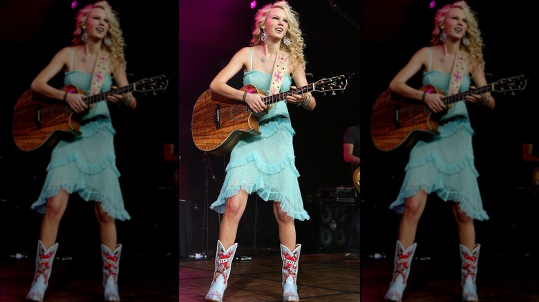 Taylor Swift playing guitar