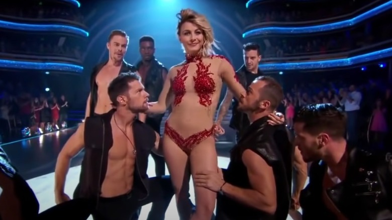 Julianne Hough surrounded by male dancers