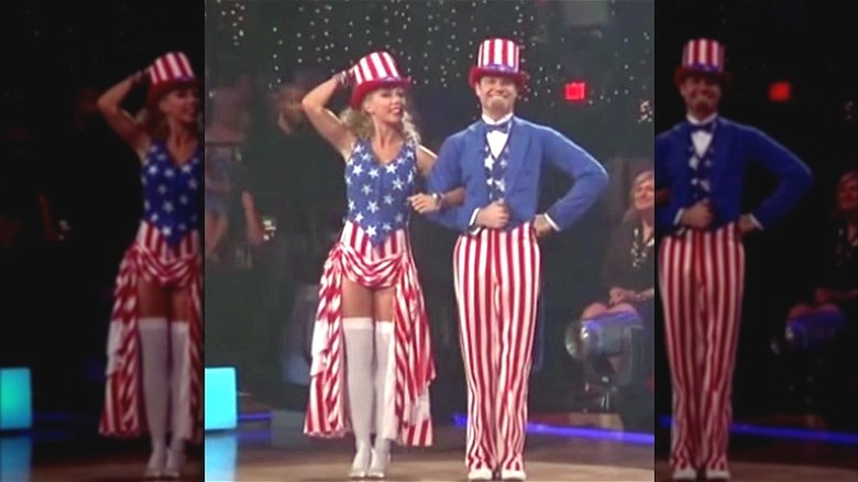 Kendra Wilkinson and Louis Van Amstel wearing American flag outfits