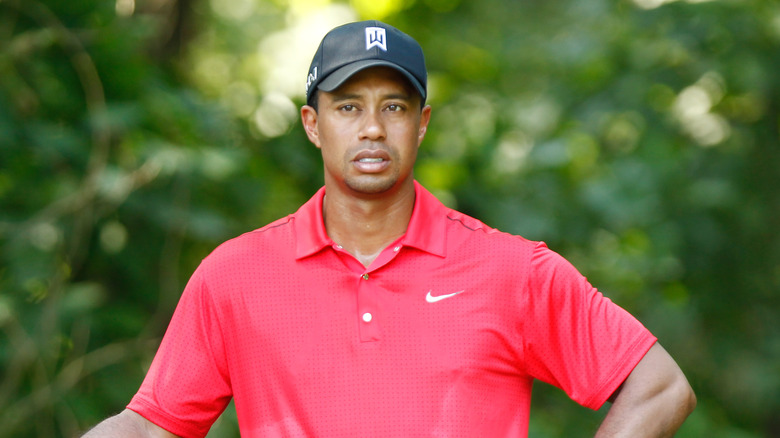 Tiger Woods looking concerned 