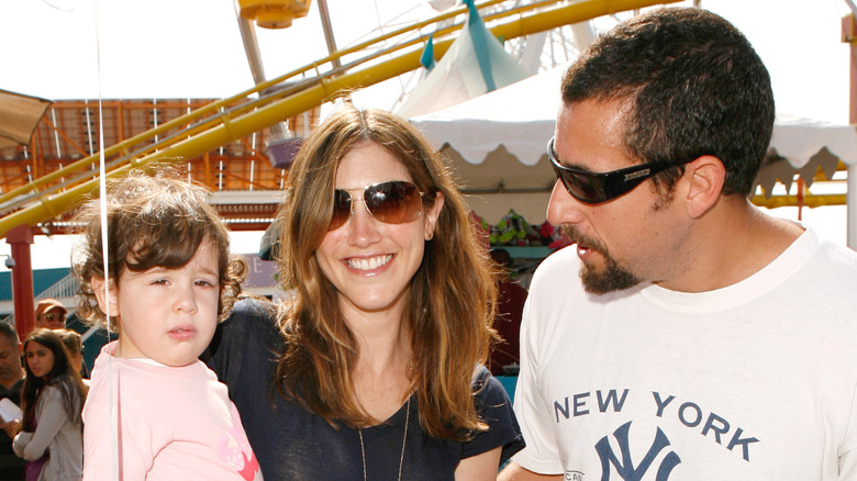 Sadie, Jackie, and Adam Sandler standing together