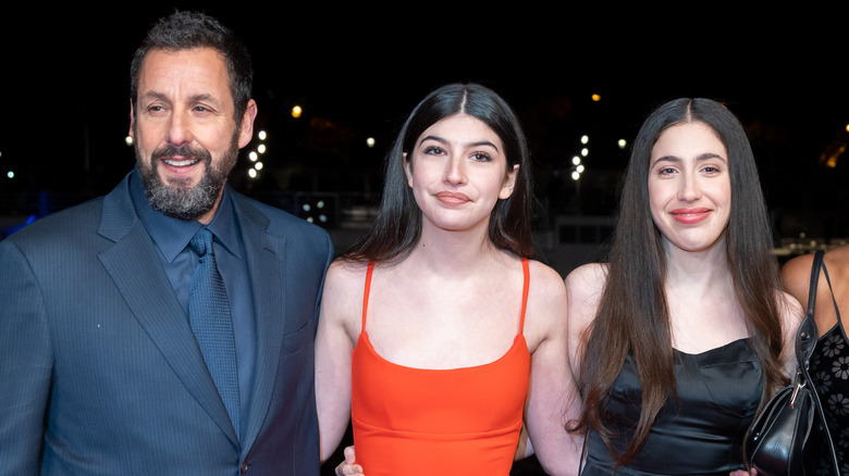 Adam, Sunny, and Sadie Sandler smiling