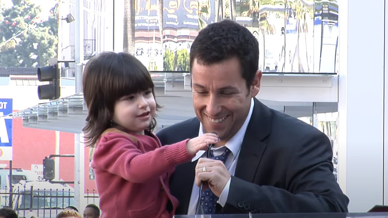 Sunny Sandler trying to take microphone from Adam Sandler