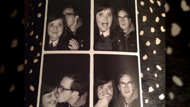 Aidy Bryant and Conner O'Malley in a photobooth