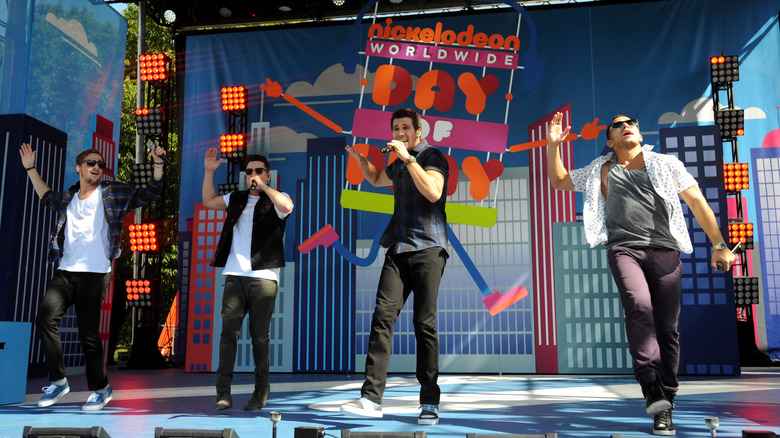 Carlos PenaVega performs with Big Time Rush