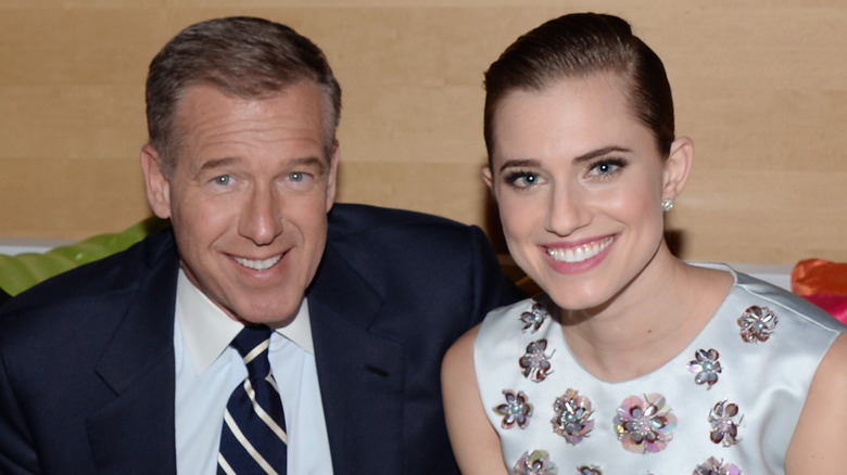 Brian Williams and daughter Allison smiling at an event