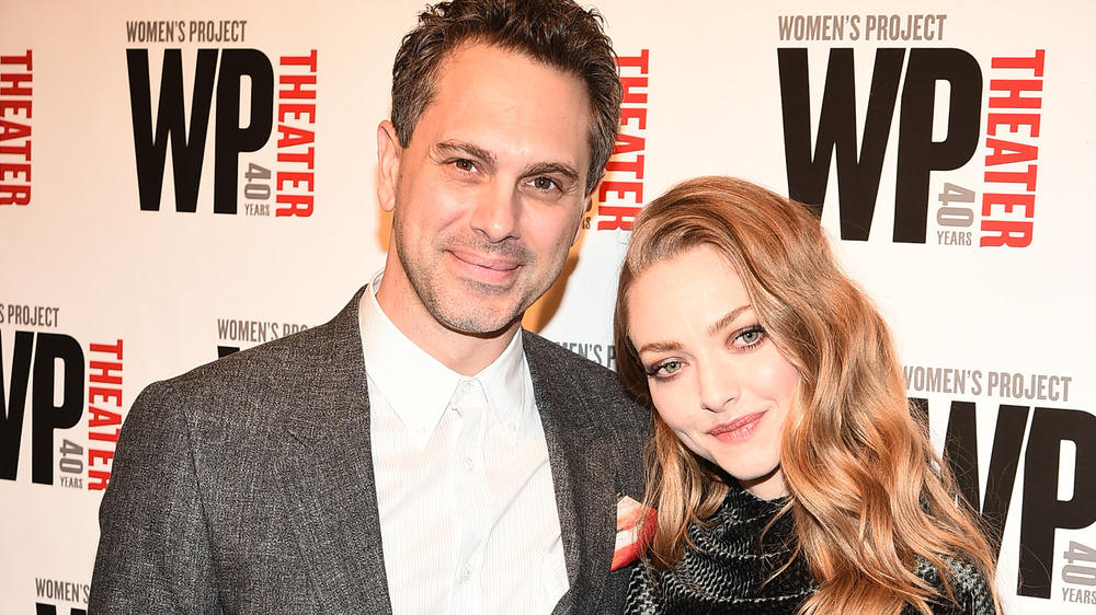 Amanda Seyfriend and Thomas Sadoski posing