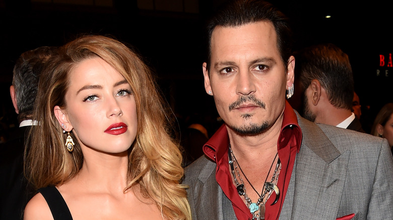 mber Heard (L) and Johnny Depp attending the "Black Mass" premiere