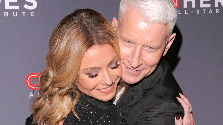 Kelly Ripa and Anderson Cooper hugging