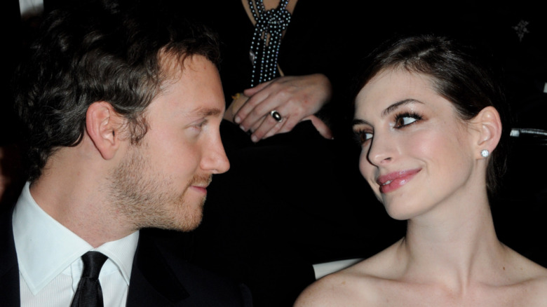 Anne Hathaway gazing at Adam Shulman